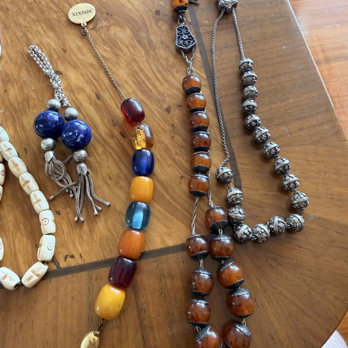 Vintage collection of 17 komboloi with natural amber and 925 silver