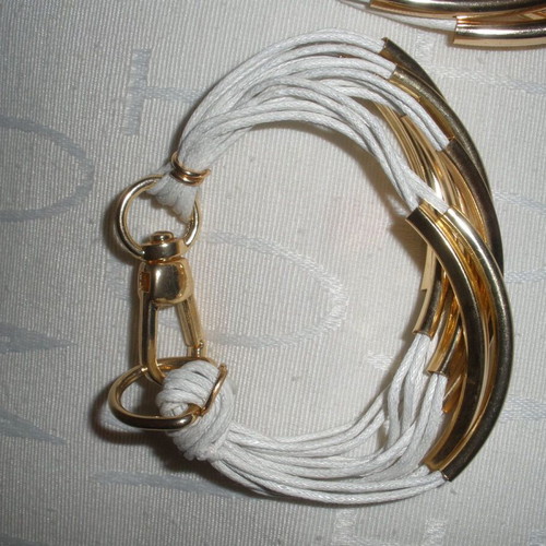 Women's jewelry set with gold-tone metal elements, boho-minimalist style