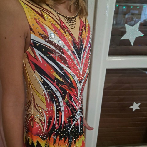 Rhythmic gymnastics leotard new with lots of sparkle multicolor