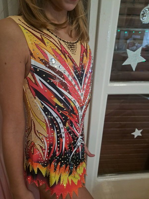 Rhythmic gymnastics leotard new with lots of sparkle multicolor