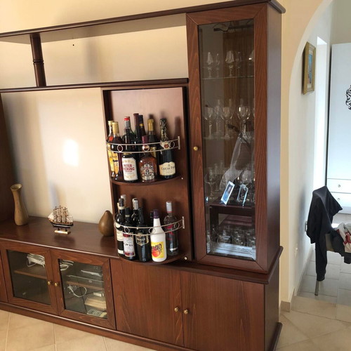 Solid beech wood living room unit like new with rotating bar