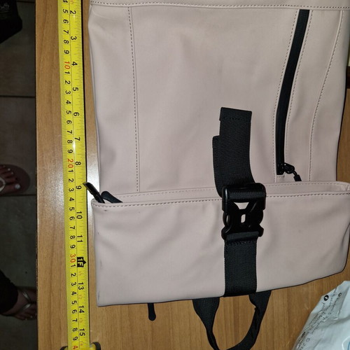 Backpack with safety buckle like new, light pink with multiple pockets