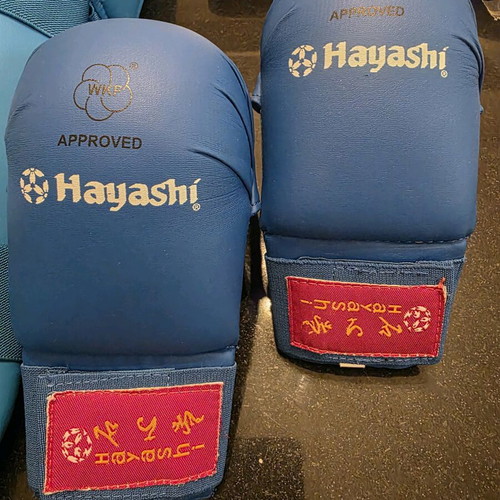 Karate equipment like new with 2 Hayashi and Force 1 suits, 4 belts, gloves, and shin guards