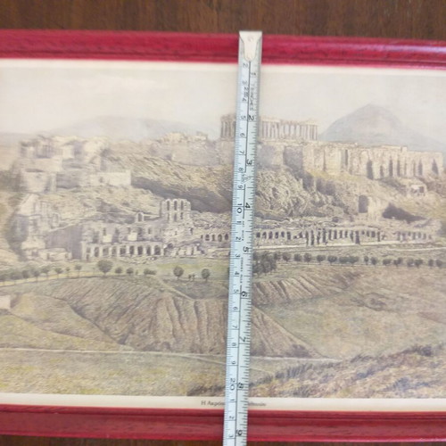Frames with old photographic views of the Acropolis and the Palaces like new