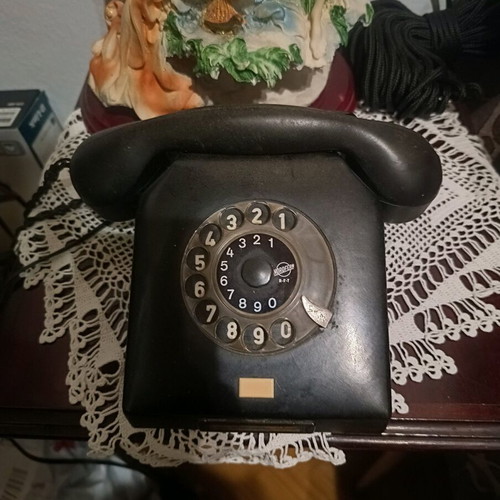 Vintage telephone device refurbished, black, wired, made in Germany