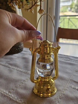 Vintage lantern lighter, iron construction, collectible