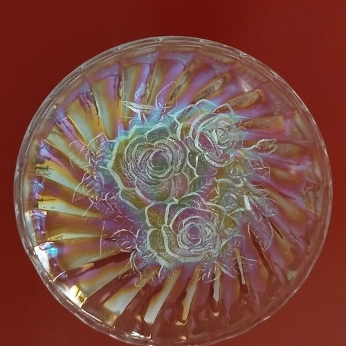 Vintage iridescent glass plate with embossed rose design