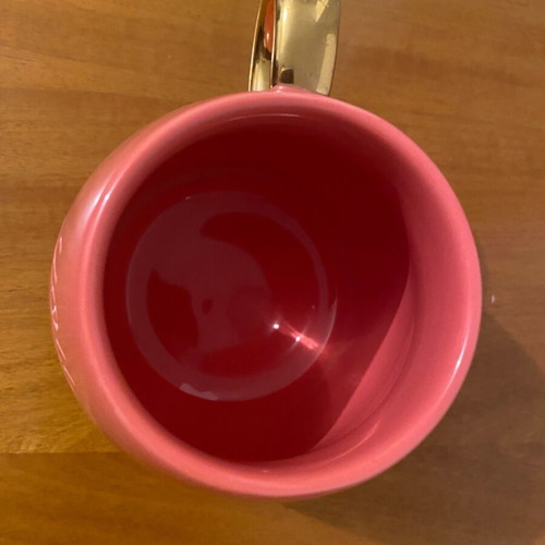 Porcelain mug pink with gold handle like new
