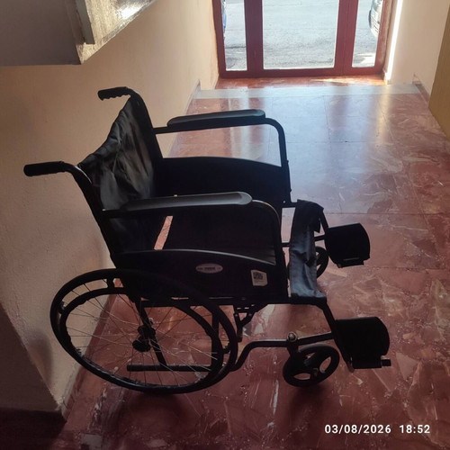 Indoor wheelchair with tripod cane and night container holder like new