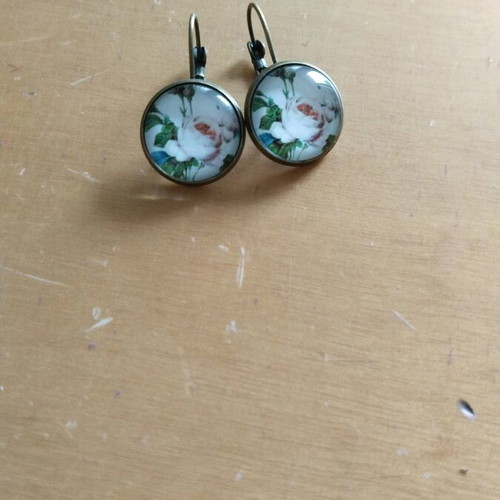 Handmade earrings with rose design like new