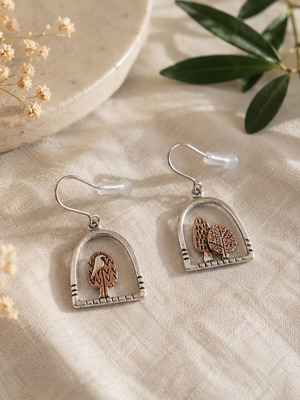 Secret Forest asymmetric earrings with trees