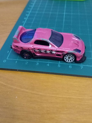 Hot Wheels 24/Seven Mazda RX-7 μεταχειρισμένο αυτοκινητάκι, ροζ χρώμα