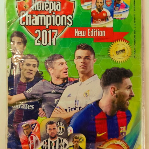 Asteria Champions 2017 collectible album with metal tags used