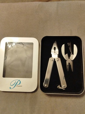 Multitool set in metal box new, unused