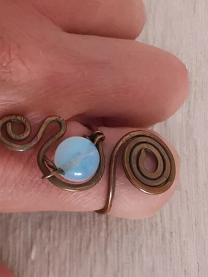 Handmade moonstone ring set used, copper with pink and gold tones