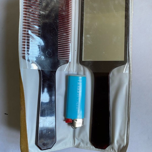 Vintage comb and hand mirror set new, collectible