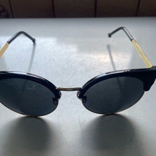 Sunglasses cat eye style like new, black and gold