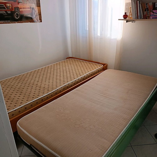 Single bed with used sliding bed and metal frame