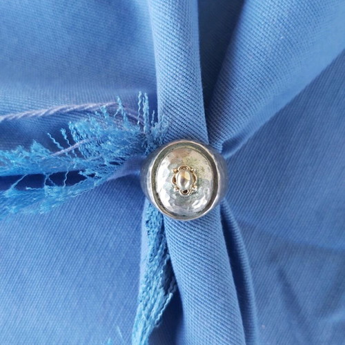 Women's ring used, hammered silver with gold