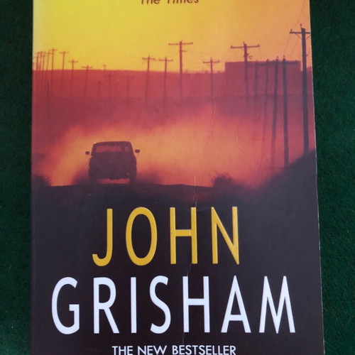 The Summons John Grisham paperback like new
