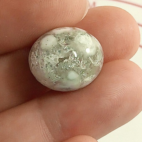 Agate semiprecious stone with crystal-filled cavity in egg shape new