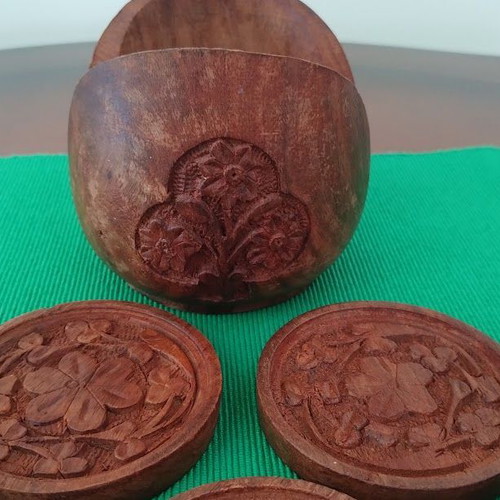 Handmade wooden coasters like new, set of six with carved floral designs