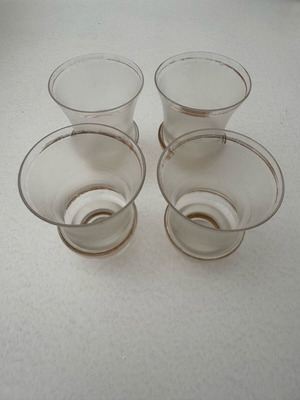 Set of 4 small vintage glasses like new with gold rim
