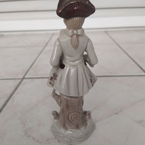 Vintage figurine of young high society man like new, height 18 cm