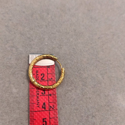 Steel earrings in gold color like new