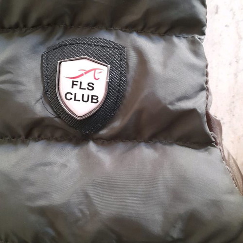 Windproof vest in excellent condition for ages 3 to 4, green