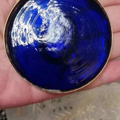 Vintage glass eye like new with ring and stainless metal