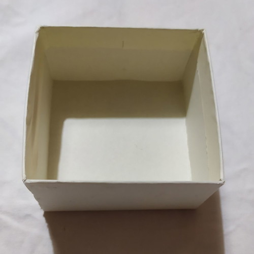 Paper box used, 7x7 cm