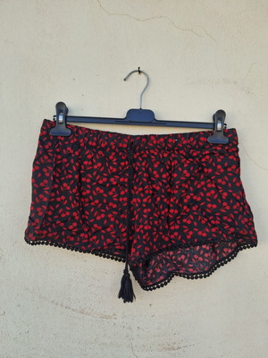 Women's Short Shorts like new, size medium, black and red