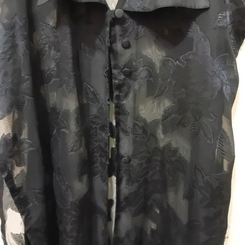 Women's sleeveless black shirt with floral pattern like new, one size