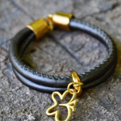 Handmade bracelet with synthetic cord and steel motif