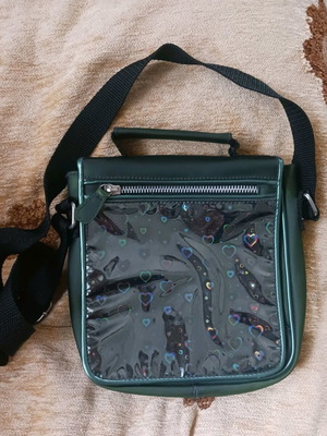 Black shoulder bag with hearts like new, waterproof for girls