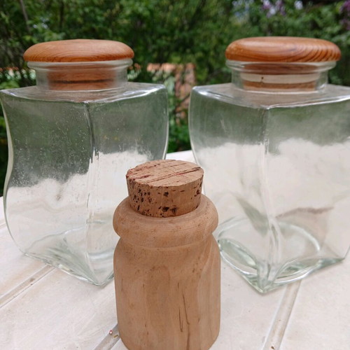 Glass vases like new with wooden lids and cork-topped jar