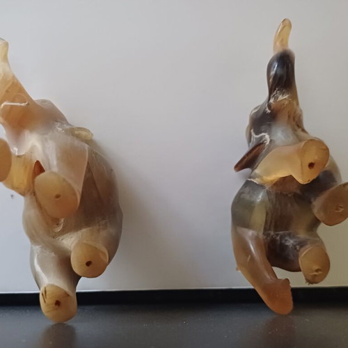 Carved elephant figurines used, set of two, missing tusks