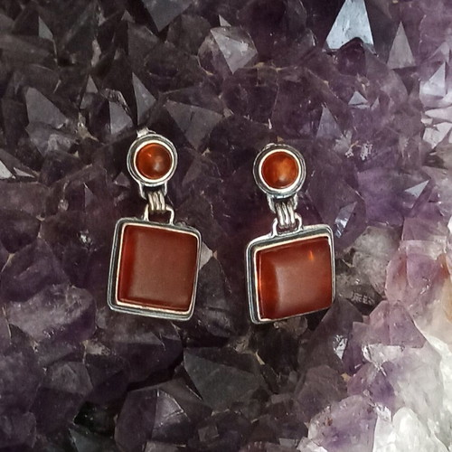 Silver 925 earrings used with natural orange amber