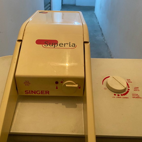 Singer ironing press used