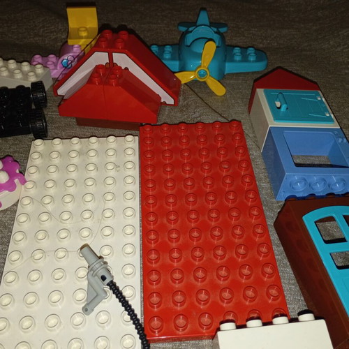 Lego DUPLO set with Minnie Mouse, planes, car and blocks