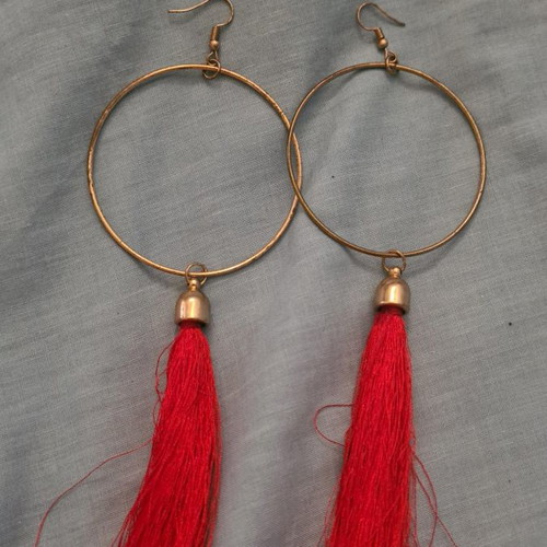 Hoop earrings used with red detail