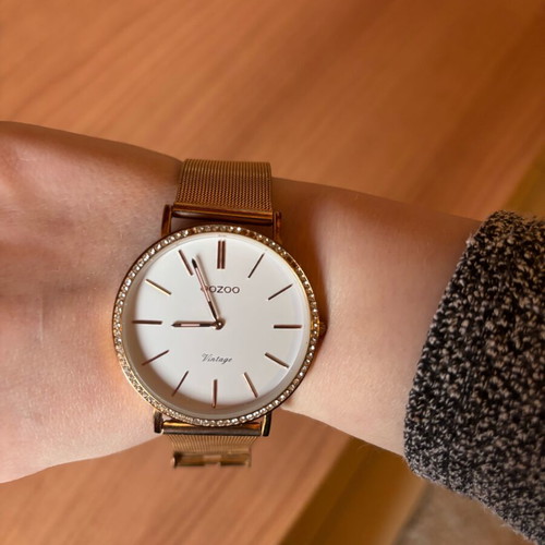 Oozoo gold watch like new, few missing rhinestones
