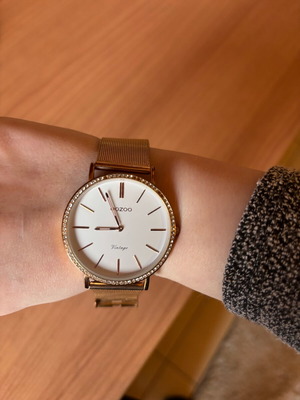Oozoo gold watch like new, few missing rhinestones