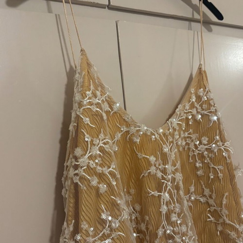 NidoDileda top with open back, yellow and white