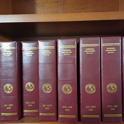 National Geographic magazines like new, 85 issues in custom leather cases