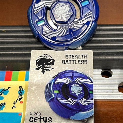 Beyblade XTS Stealth Battler X-203 Cetus Quake used with launcher and card