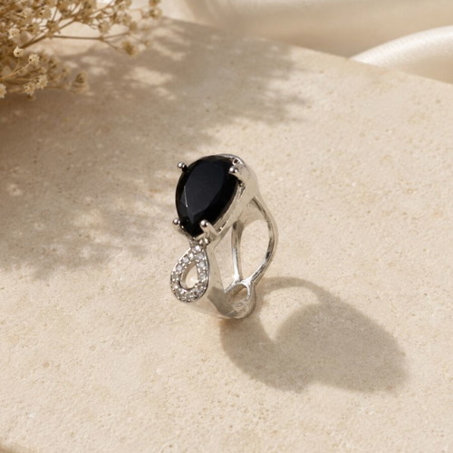 Silver ring with black stone