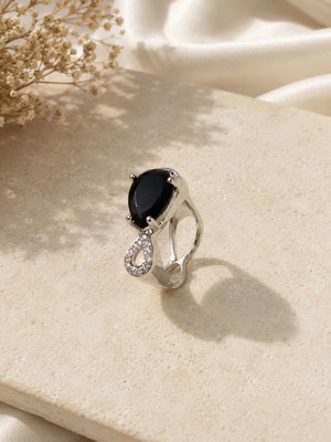 Silver ring with black stone