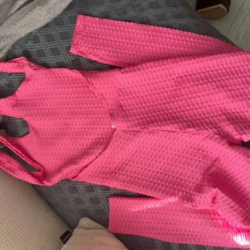Women's sports jumpsuit with cut-out back like new, pink, size S/M